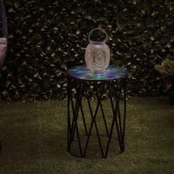 8" Outdoor Metal Hollow Lantern With Rotating LED Lights Antique White - Alpine Corporation