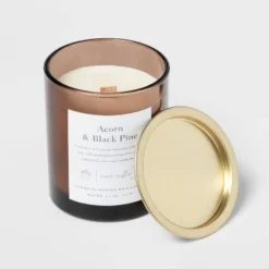 Clear Colored Glass With Woodwick And Brass Metal Inset Lid Acorn + Black Pine Candle Brown - Threshold™ -Adesso Shop GUEST e82cdb94 c293 4984 b5b6 1ca170680739